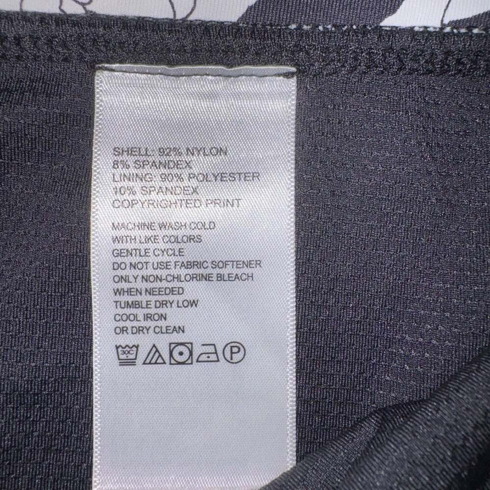 EUC TOMMY BAHAMA SZ L AUBREY ISLAND ZONE SKORT SKIRT BLACK & WHITE FLORAL PRINT - Picture 7 of 10